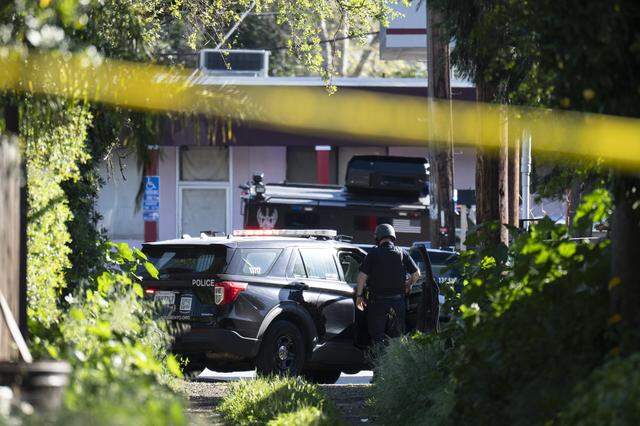 Sacramento Police officers respond to a standoff incident at the Oak Park Market in South Oak Park on Thursday, March 12, 2026.